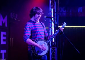 Picture of Dan Walsh with his Banjo